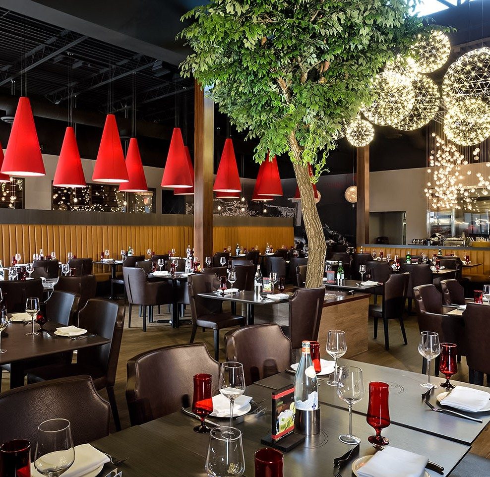 Dining room with red pendant lights